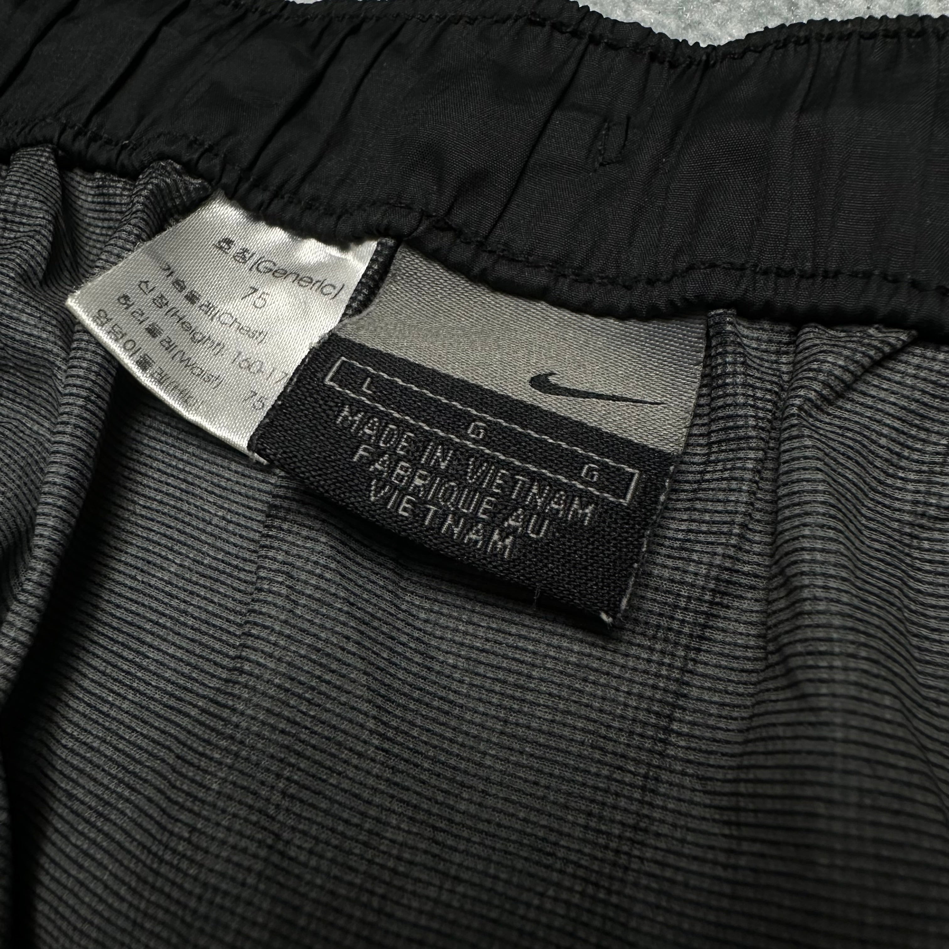 Vintage Nike Trackpants (S-M)