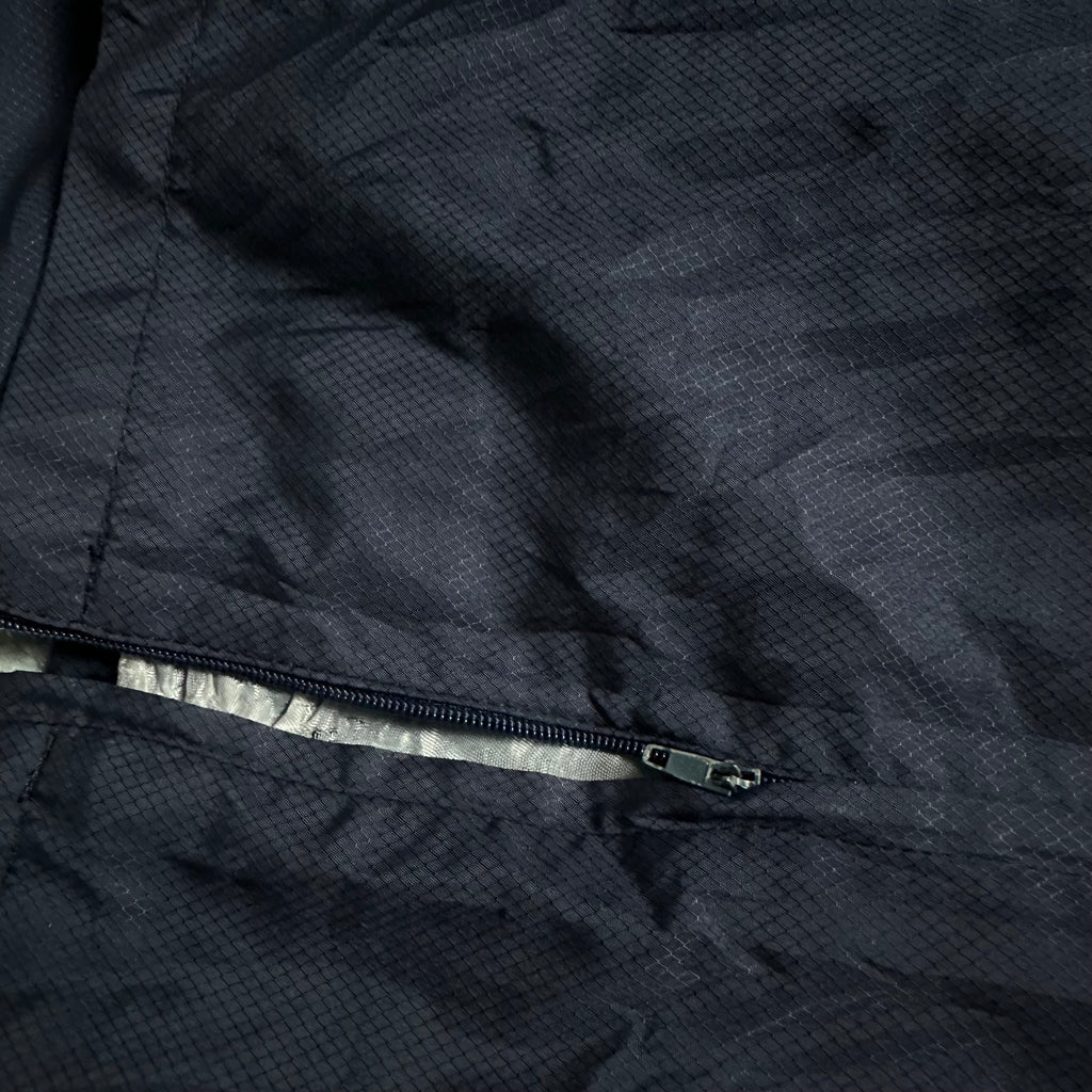 Vintage Nike Trackpants (M-L)