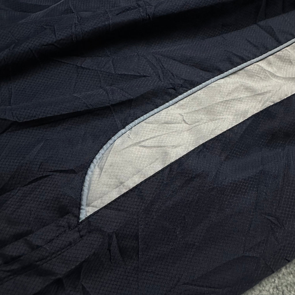 Vintage Nike Trackpants (M-L)