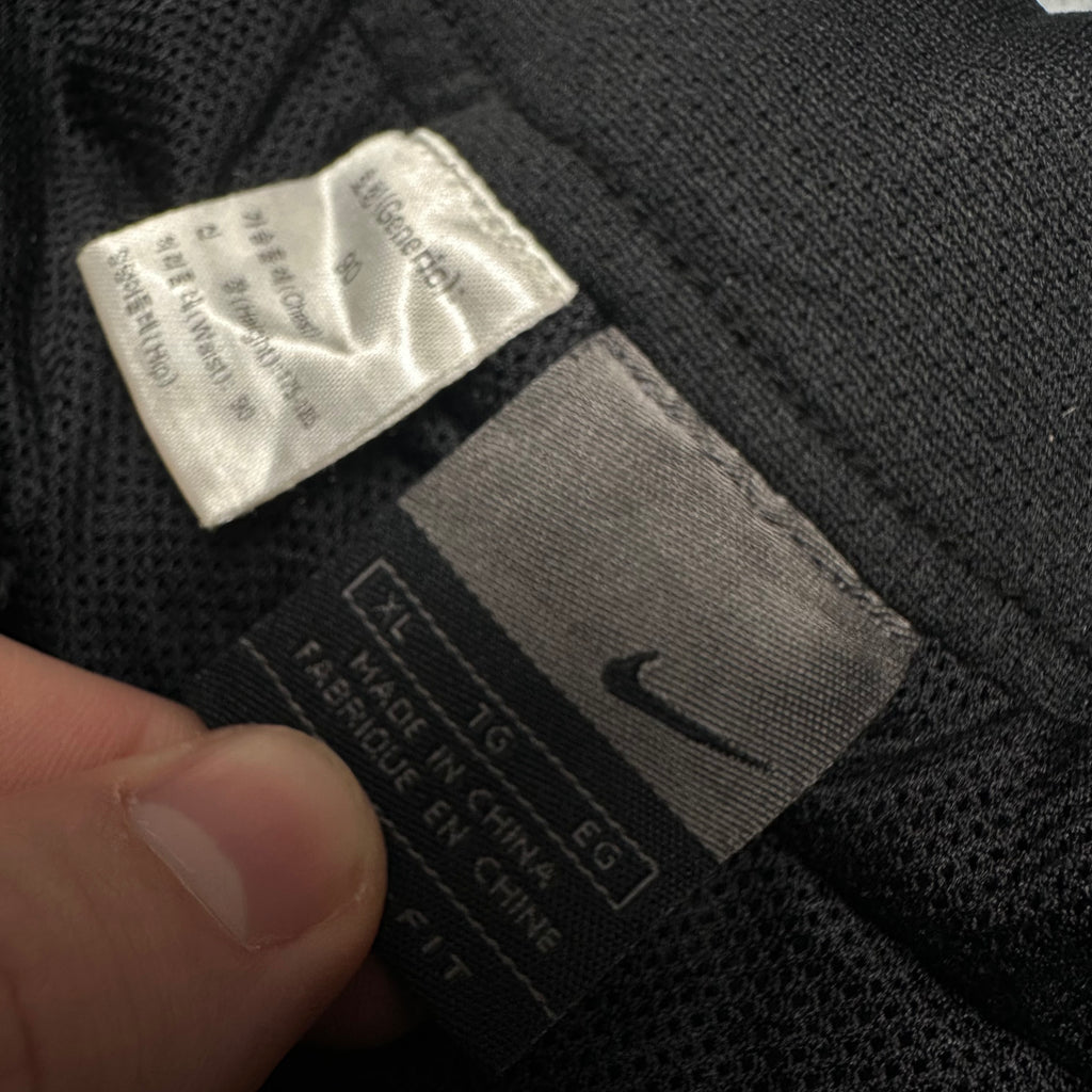 Vintage Nike Trackpants (M-L)
