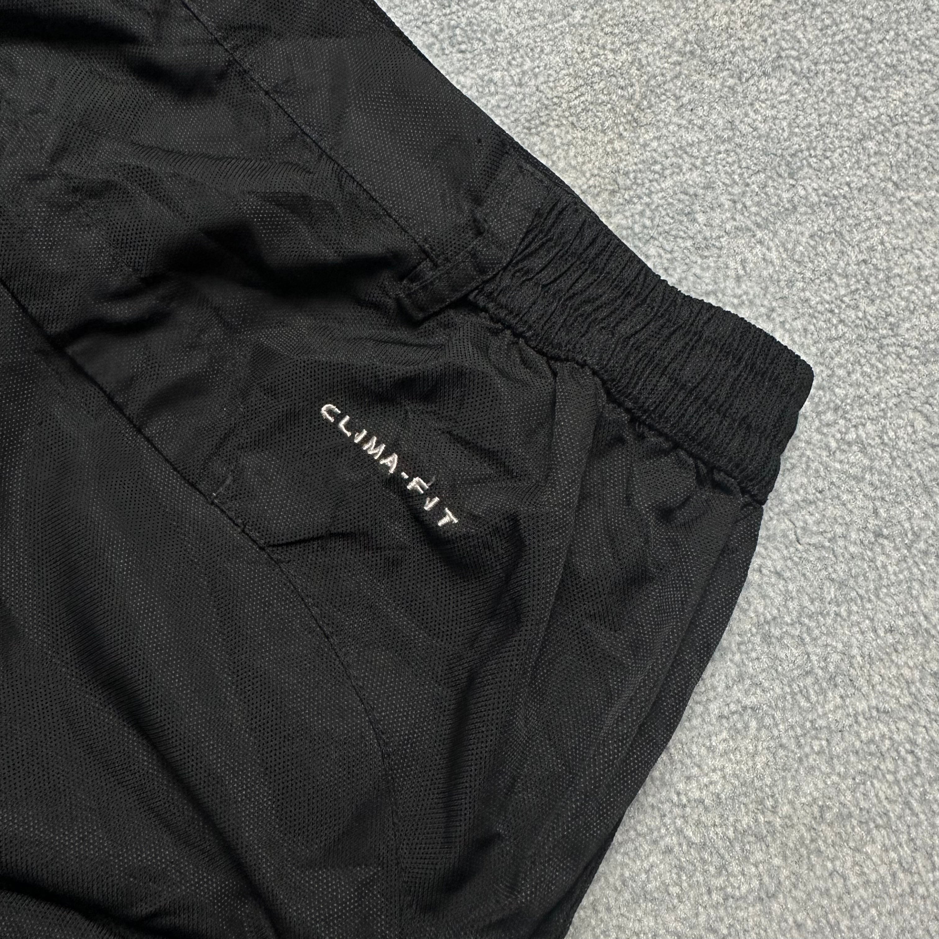 Vintage Nike Trackpants (M-L)