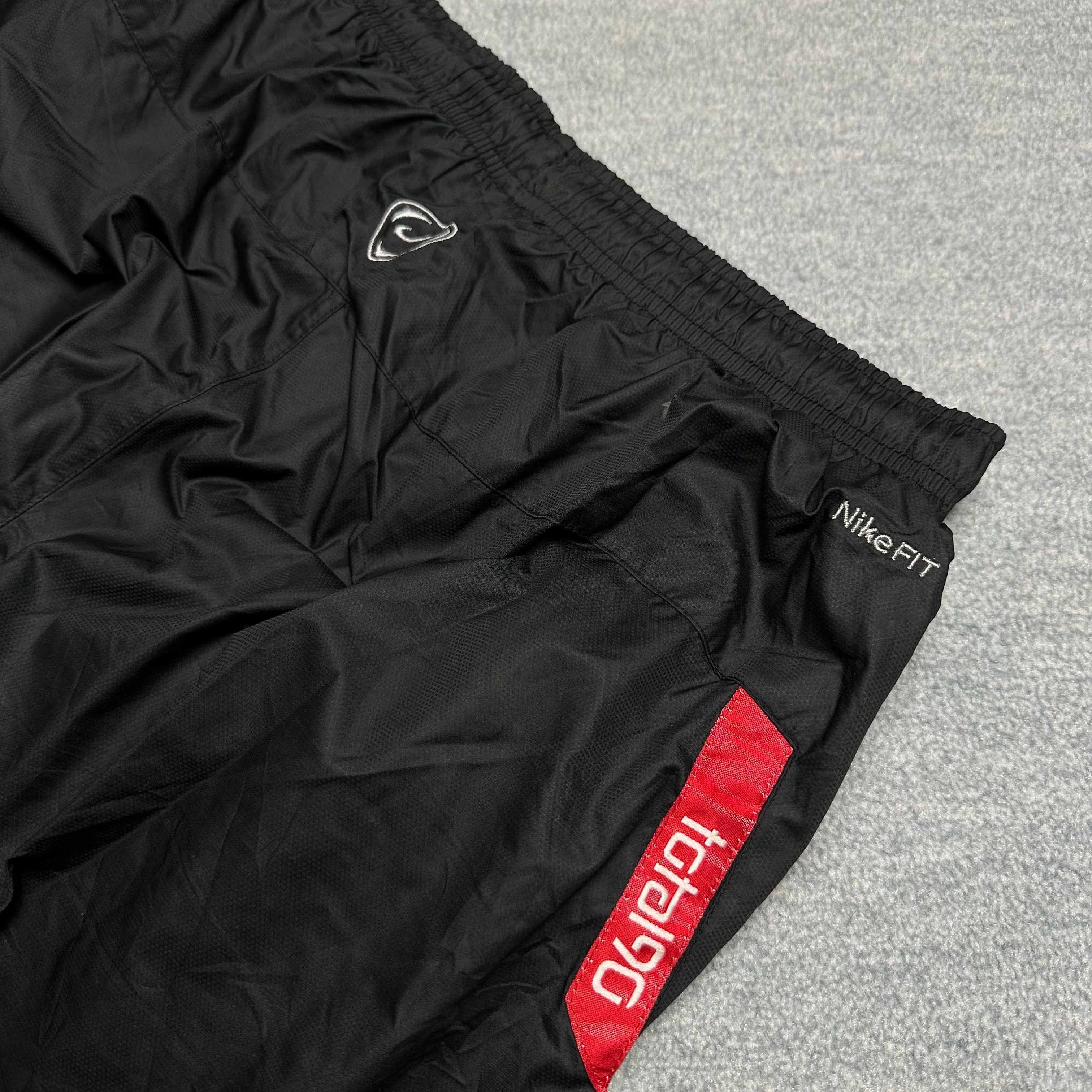 Vintage Nike Trackpants (M-L)