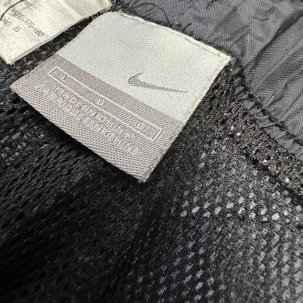 Vintage Nike Trackpants (M-L)